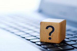 question-mark-wooden-cube-computer-keyboard-with-blurred-background-shallow-depth-field-300×200